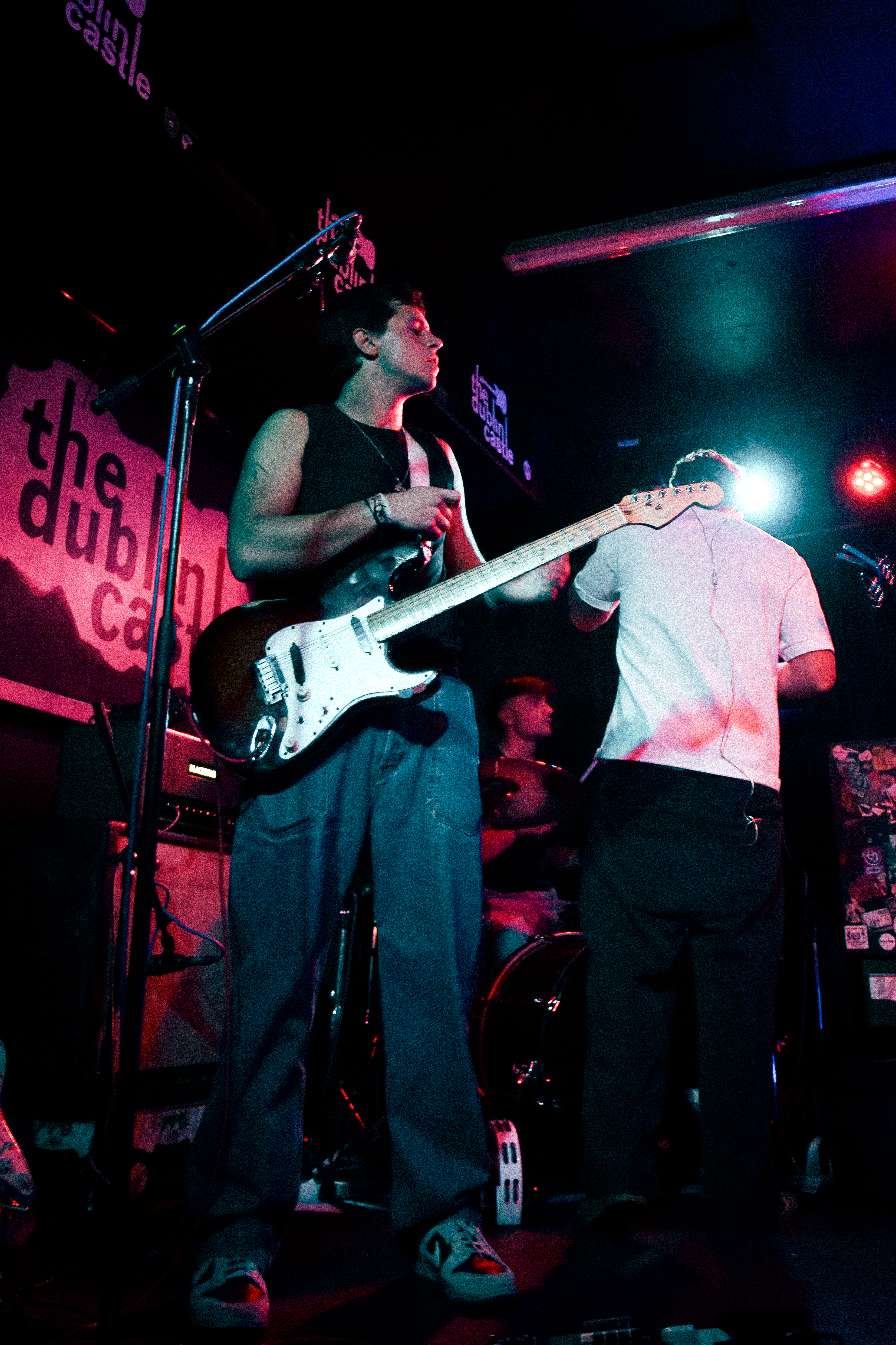 Cheap Street guitarists performing live